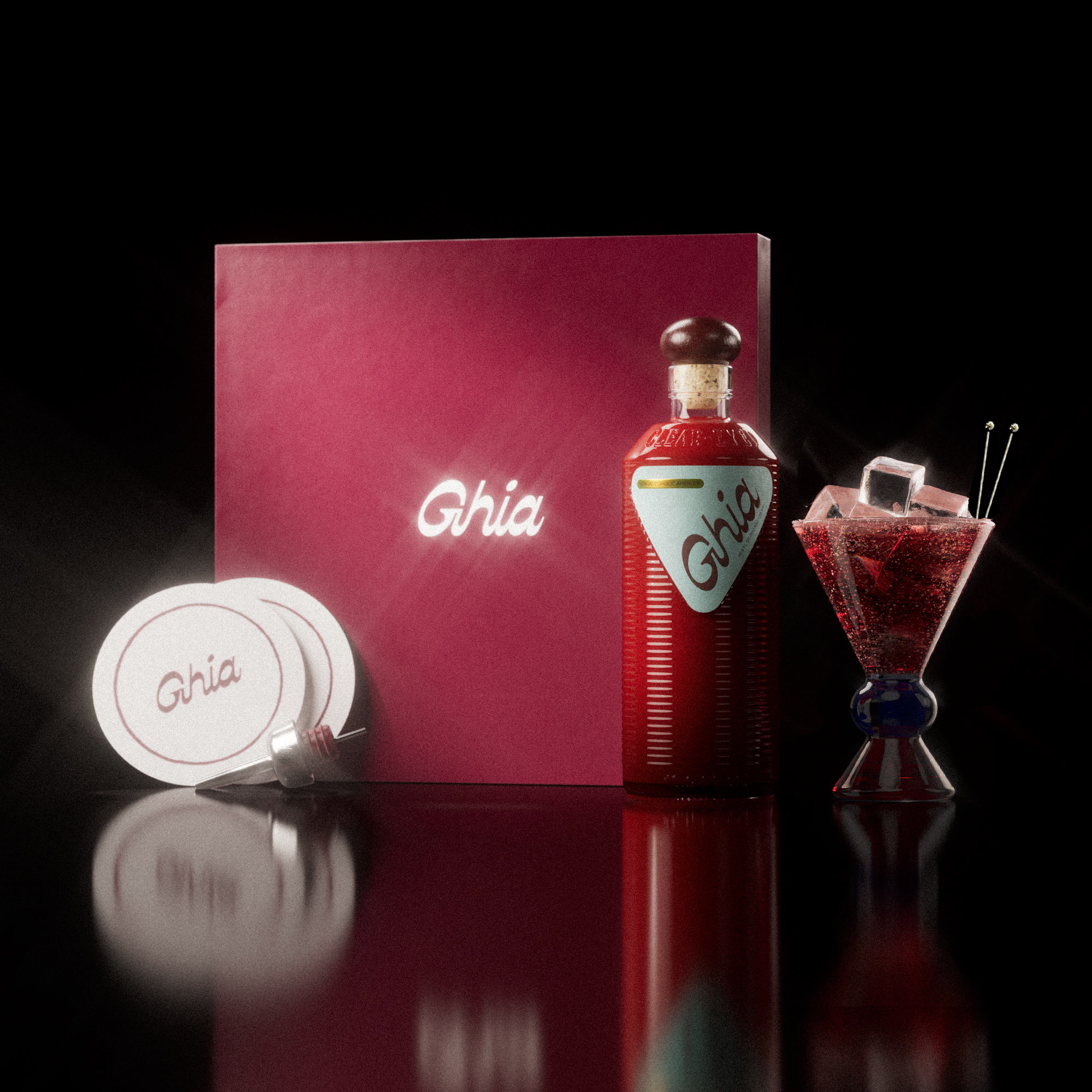 A Ghia non-alcoholic aperitif gift set with a burgundy box, paper coasters, 1 glass bottle of Original Apéritif, and a decorative cocktail glass that has a blue and amber base.